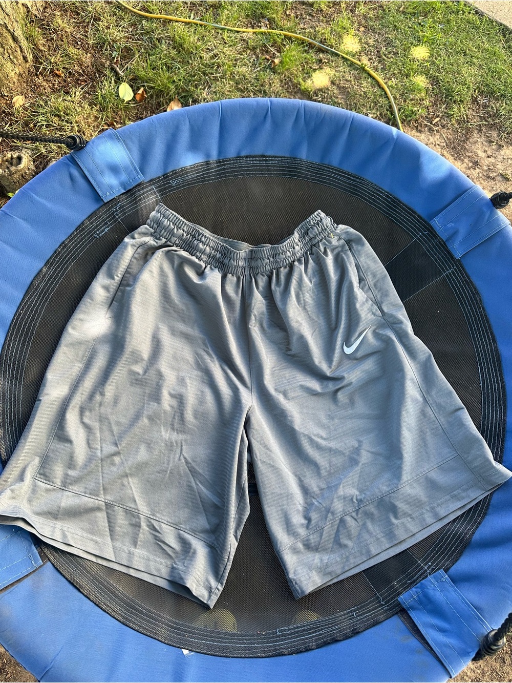 Nike Men’s Gray Athletic Shorts with White Swoosh
